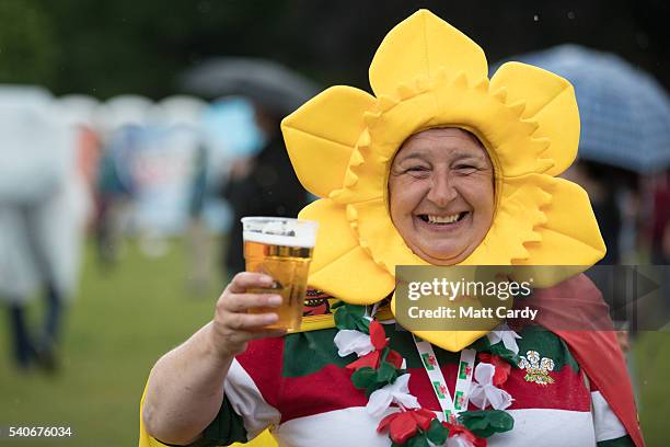 Welsh fans gather to watch the UEFA EURO 2016 Group B match between England and Wales on June 16, 2016 in Cardiff, Wales. Having beaten Slovakia in...