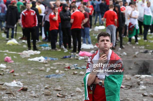 Welsh fans react at the end of the UEFA EURO 2016 Group B match between England and Wales on June 16, 2016 in Cardiff, Wales. Having beaten Slovakia...