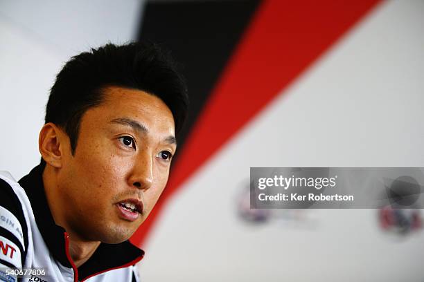 Kazuki Nakajima of Japan and Toyota Gazoo Racing is interviewed at a media session prior to qualifying for the Le Mans 24 Hour race at the Circuit de...