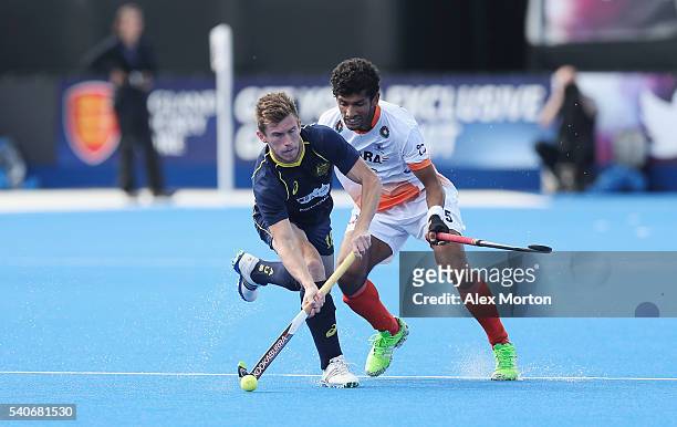 Tristan White of Australia and Kothajit Khadangbam during the FIH Mens Hero Hockey Champions Trophy match between Australia and India at Queen...