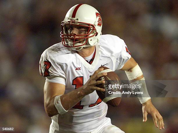 Philip Rivers of N.C.St. Runs with the ball during as Florida State defeated North Carolina State at Doak Campell Stadium in Tallahassee , Fl.. N.C....