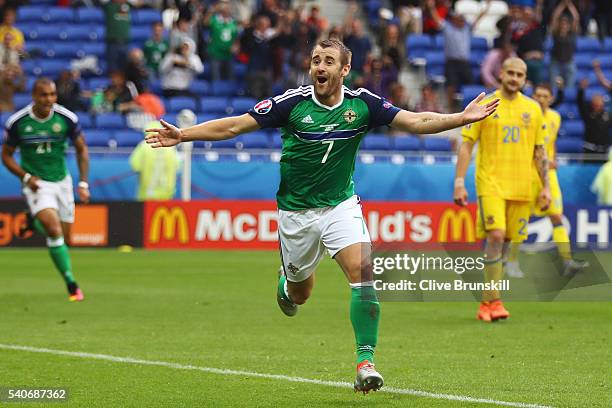 Niall McGinn of Northern Ireland celebrates scoring his team's second goal during the UEFA EURO 2016 Group C match between Ukraine and Northern...