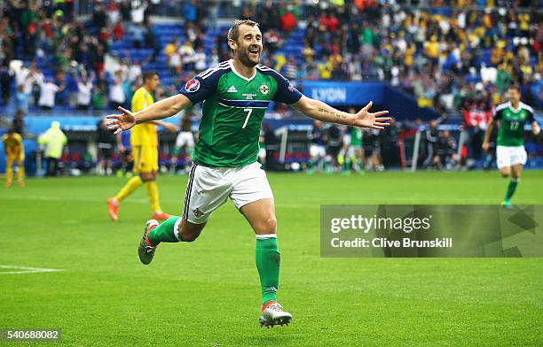 Niall McGinn of Northern Ireland celebrates scoring his team's second goal during the UEFA EURO 2016 Group C match between Ukraine and Northern...