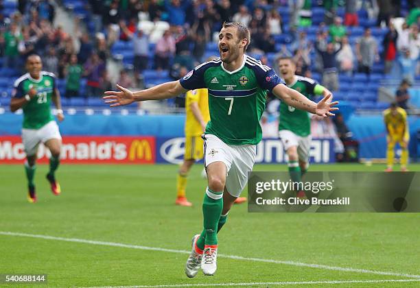 Niall McGinn of Northern Ireland celebrates scoring his team's second goal during the UEFA EURO 2016 Group C match between Ukraine and Northern...