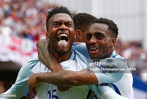 Daniel Sturridge and Danny Rose of England celebrate England's second goal during the UEFA EURO 2016 Group B match between England and Wales at Stade...