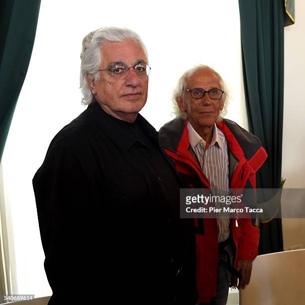 Artist Christo Vladimirov Javacheff and Germano Celant attend the presentation of his installation the 'The Floating Piers' on June 16, 2016 in...