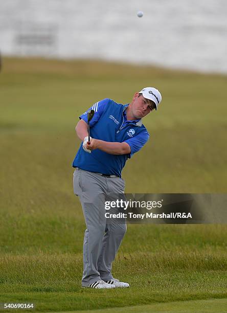 Robert MacIntyre of Glencruitten chips onto the 17th green during The Amateur Championship 2016 - Day Four at Royal Porthcawl Golf Club on June 16,...