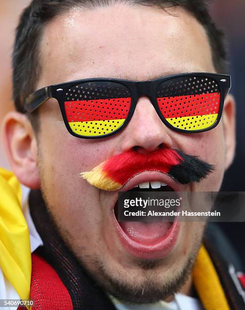 Germany fan enjoys the pre match atmosphere during the UEFA EURO 2016 Group C match between Germany and Poland at Stade de France on June 16, 2016 in...