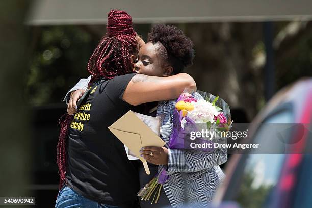 Mourners arrive for the viewing and funeral service Kimberly Morris, June 16, 2016 in Kissimmee, Florida. Morris, who worked as a bouncer at the...