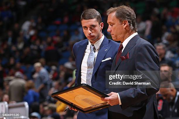 Flip Saunders and Ryan Saunders of the Minnesota Timberwolves draw up plays during the game against the Chicago Bulls on November 1, 2014 at Target...