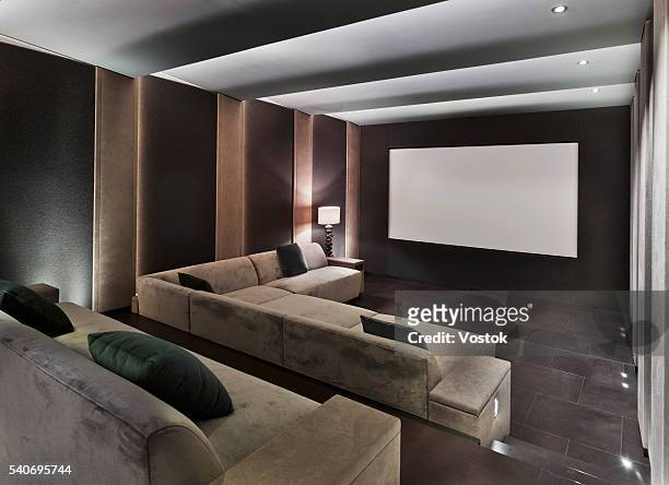 home cinema in mansion - film and television screening stock pictures, royalty-free photos & images