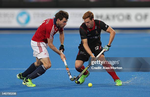 Alistair Brogdon of Great Britain and Gauthier Boccard of Belgium during the FIH Mens Hero Hockey Champions Trophy match between Great Britain and...