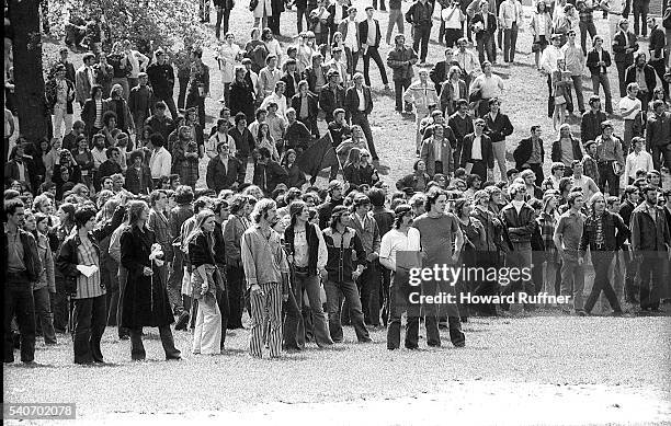 View of students, at the base of Blanket Hill, during an anti-war demonstration at Kent State University, Kent, Ohio, May 4, 1970. Shortly after this...