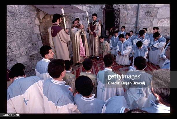 Three-hour long litury for Armenian Christians ends on the roof of a church beside a small chapel in Jerusalem.