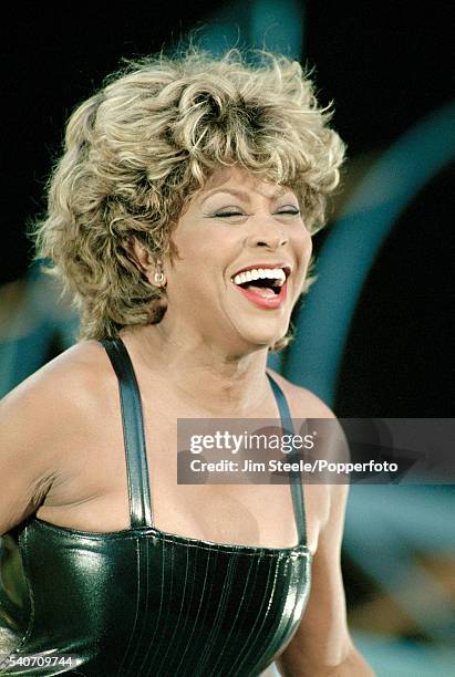 Tina Turner performing on stage at Wembley Stadium in London on the 15th July, 2000.