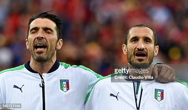 Gianluigi Buffon and Giorgio Chiellini of Italy sing the national anthem prior to during the UEFA EURO 2016 Group E match between Belgium and Italy...