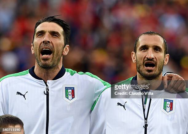 Gianluigi Buffon and Giorgio Chiellini of Italy sing the national anthem prior to during the UEFA EURO 2016 Group E match between Belgium and Italy...