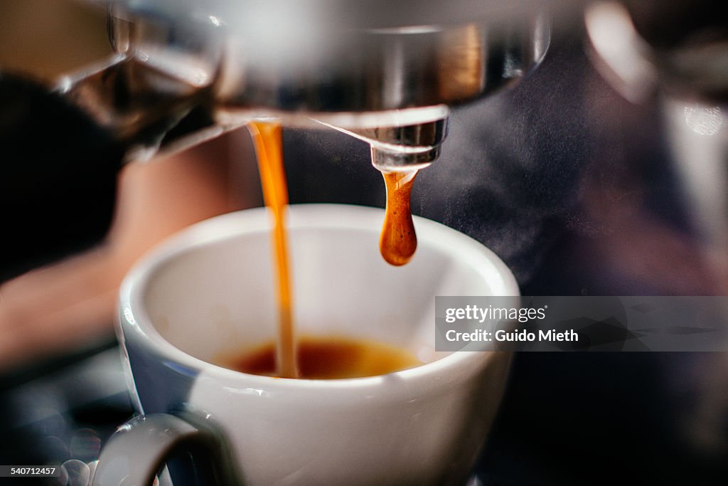 Espresso shot pouring out.