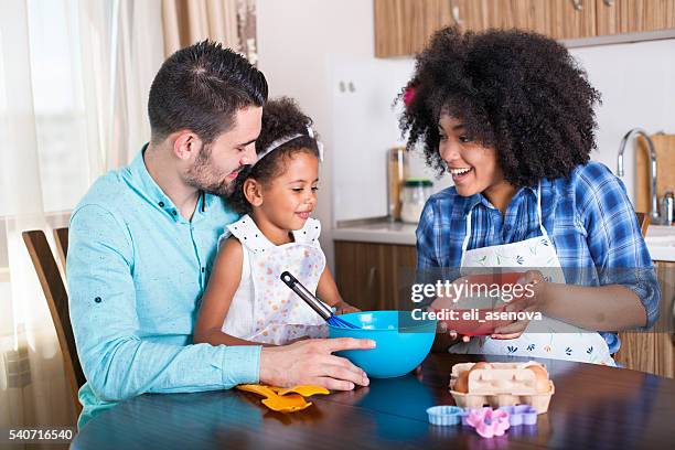 young happy family baking together - baby chef stock pictures, royalty-free photos & images