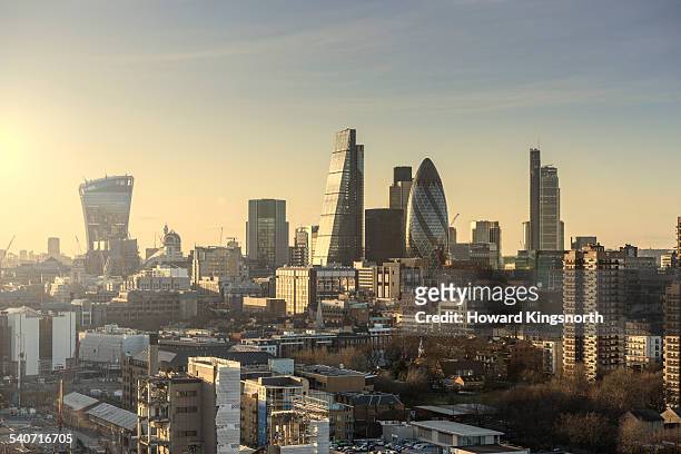 aerial of city of london at sunset looking west - london skyline stock pictures, royalty-free photos & images