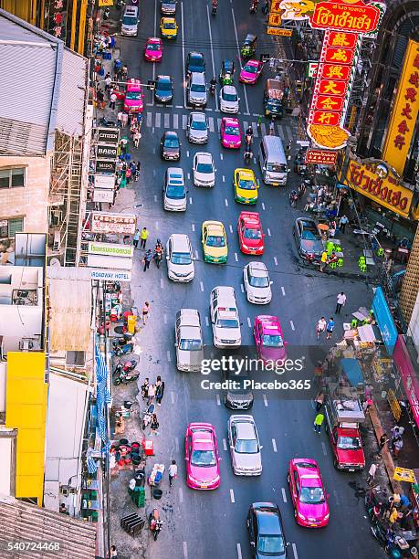 crowds in rush hour traffic, city street - association of southeast asian nations stock pictures, royalty-free photos & images