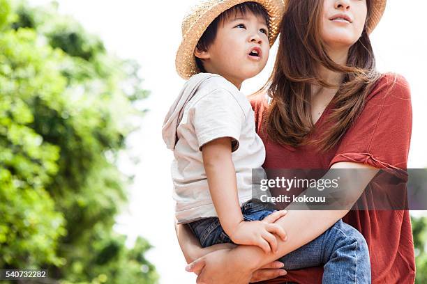 children that have been faced in the mother in park - trip hazard stock pictures, royalty-free photos & images