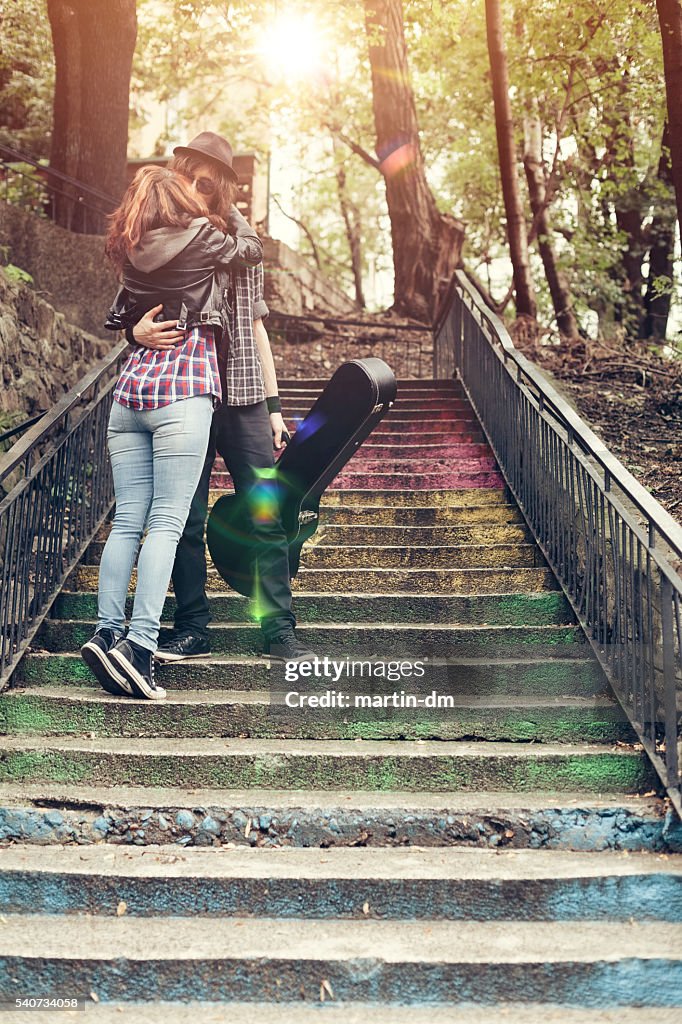 Young couple kissing in the park