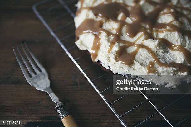 salted caramel cake - rekha garton stock pictures, royalty-free photos & images