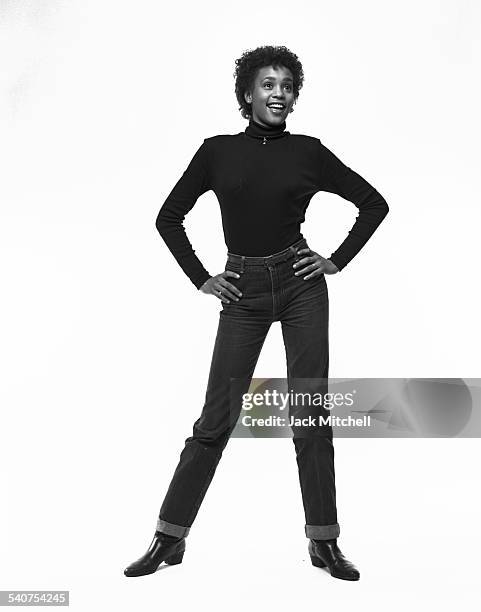 Singer Whitney Houston photographed in February 1982 when she was a senior in high school .