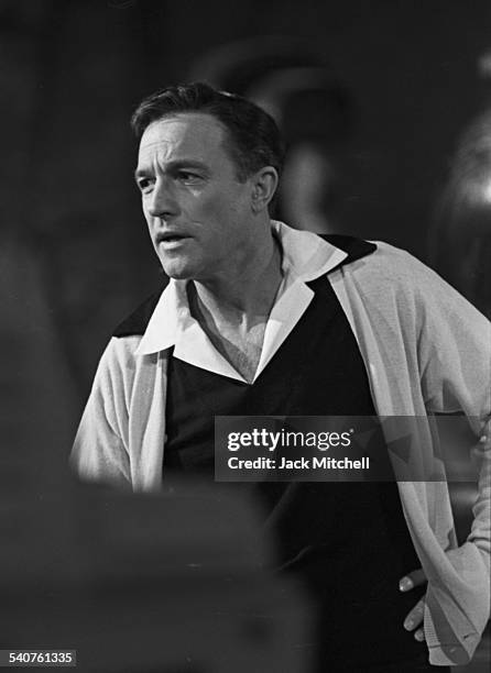 Dancer and choreographer Gene Kelly performing at night in the sculpture garden of the Museum of Modern Art for the CBS television special "New York,...