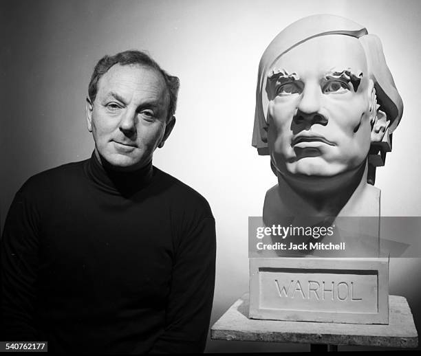 Artist Gerald Laing with his larger-than-life bust of Andy Warhol, in November 1988.