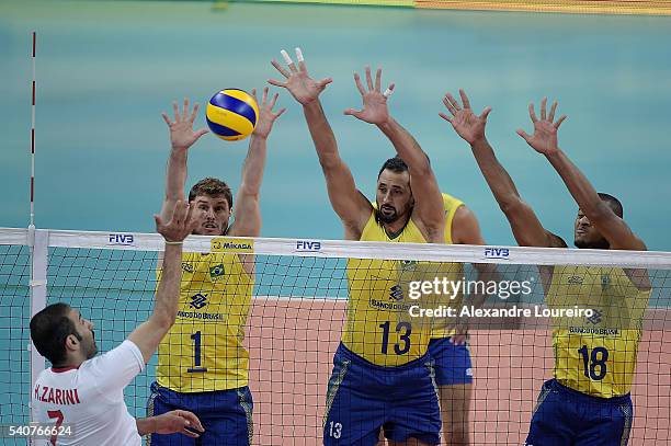 Bruno Rezende , Mauricio Souza and Lucarelli of Brazil blocks the ball during the match between Brazil and Iran on the FIVB World League 2016 - Day 1...