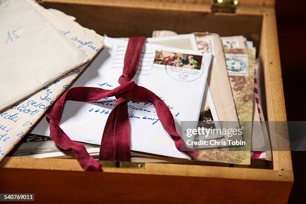 old letters in box - memories box stock pictures, royalty-free photos & images