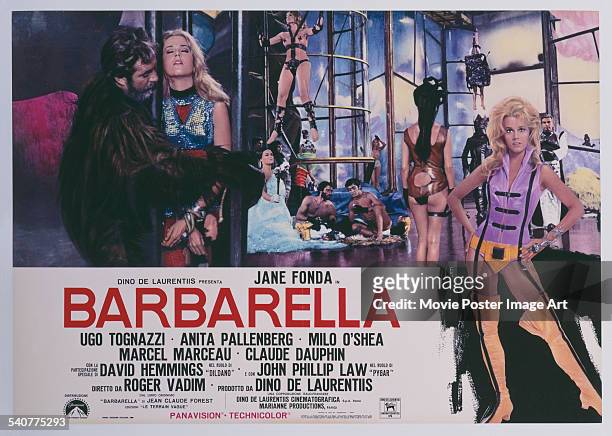 An Italian poster for Roger Vadim's 1968 adventure film 'Barbarella' starring Jane Fonda and Ugo Tognazzi.