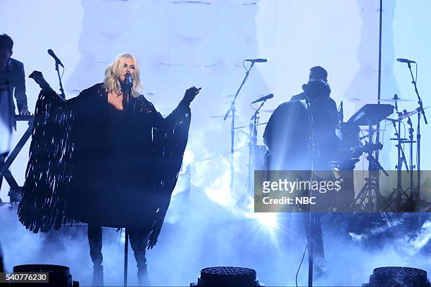 Episode 0490 -- Pictured: Sarah Barthel and Josh Carter of musical guest Phantogram perform on June 16, 2016 --