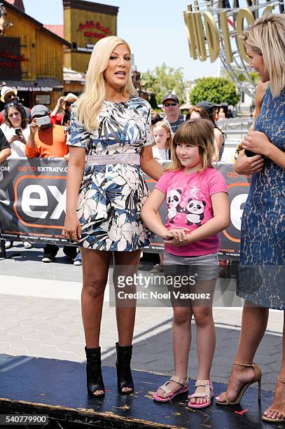 Tori Spelling and Stella Doreen McDermot visit "Extra" at Universal Studios Hollywood on June 16, 2016 in Universal City, California.