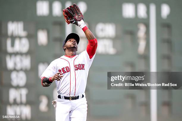 Rusney Castillo of the Boston Red Sox catches a fly ball during the second inning of a game against the Baltimore Orioles on June 16, 2016 at Fenway...