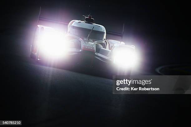 The Audi Sport Team Joest R18 of Lucas di Grassi, Loic Duval and Oliver Jarvis drives during qualifying for the Le Mans 24 Hour race at the Circuit...