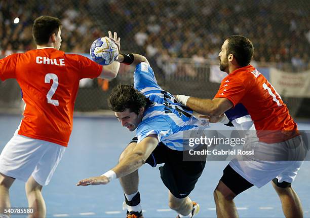 Federico Vieyra of Argentina fights for the ball with Sebastián Ceballos of Chile during a match between Argentina and Chile as part of Panamericano...