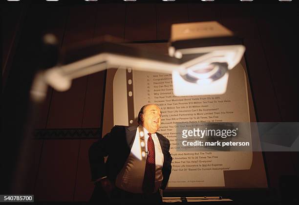 Businessman gives a presentation at the twentieth anniversary of the Money Show Convention held in Orlando, Florida.