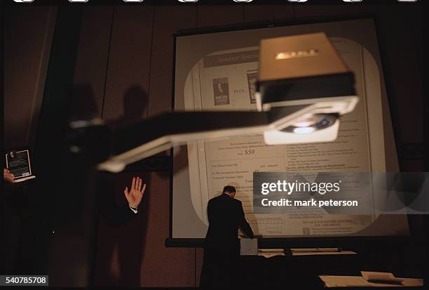 Businessman gives a presentation at the twentieth anniversary of the Money Show Convention held in Orlando, Florida.