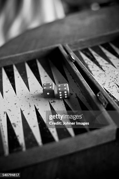 dice on backgammon board - backgammon stock pictures, royalty-free photos & images