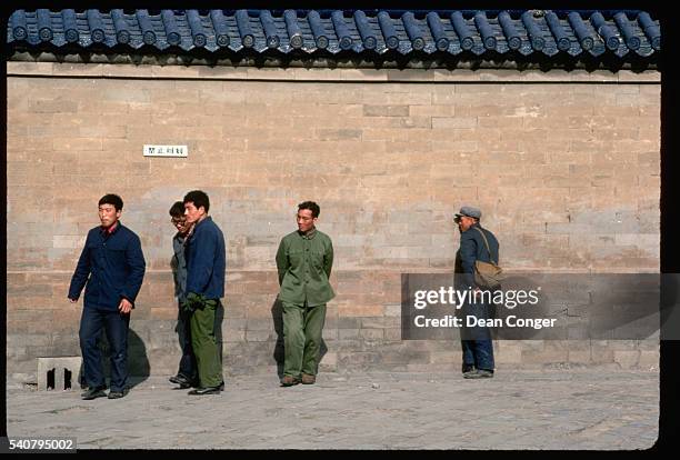 Men by Whispering Wall in Beijing