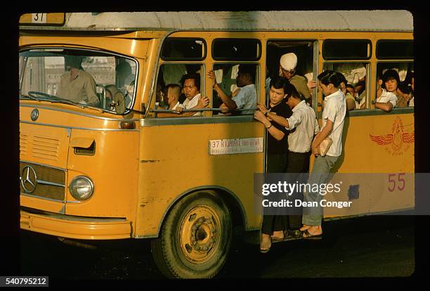 Passengers on Crowded Bus