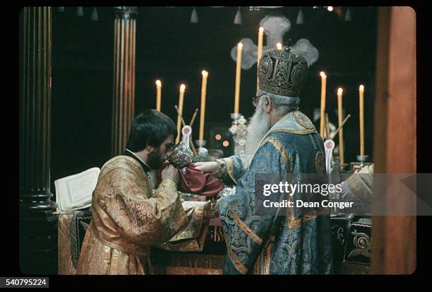 Orthodox Priest Gives Sacraments During Easter Services