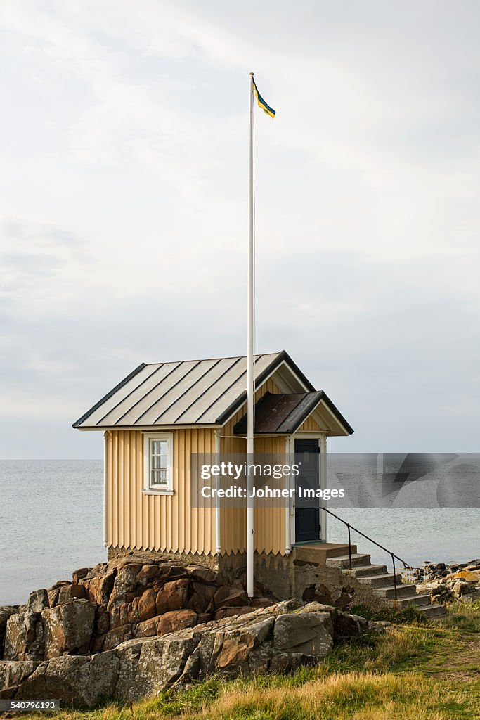 Wooden building on coast