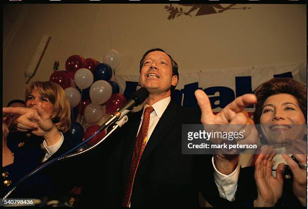 New York Governor George Pataki attends a rally at the National Federation of Republican Women's Club in Manhattan with running mate Betsy McCaughey...