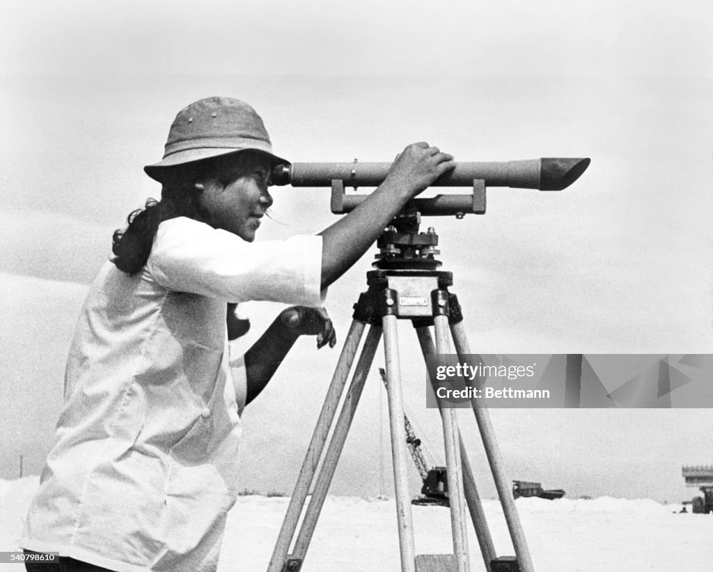Not Field Work Here's a young lady who is not working in a rice field, but a field ...