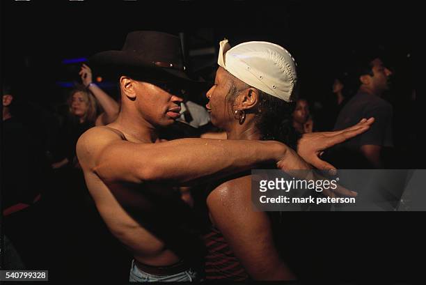 Couple dances together at Club Shelter, a New York City dance club.