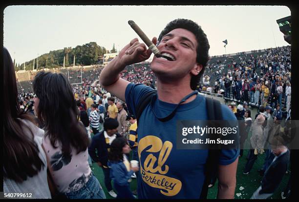 berkeley fan smoking a cigar - berkeley california stock pictures, royalty-free photos & images